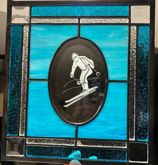 Blue beveled skier